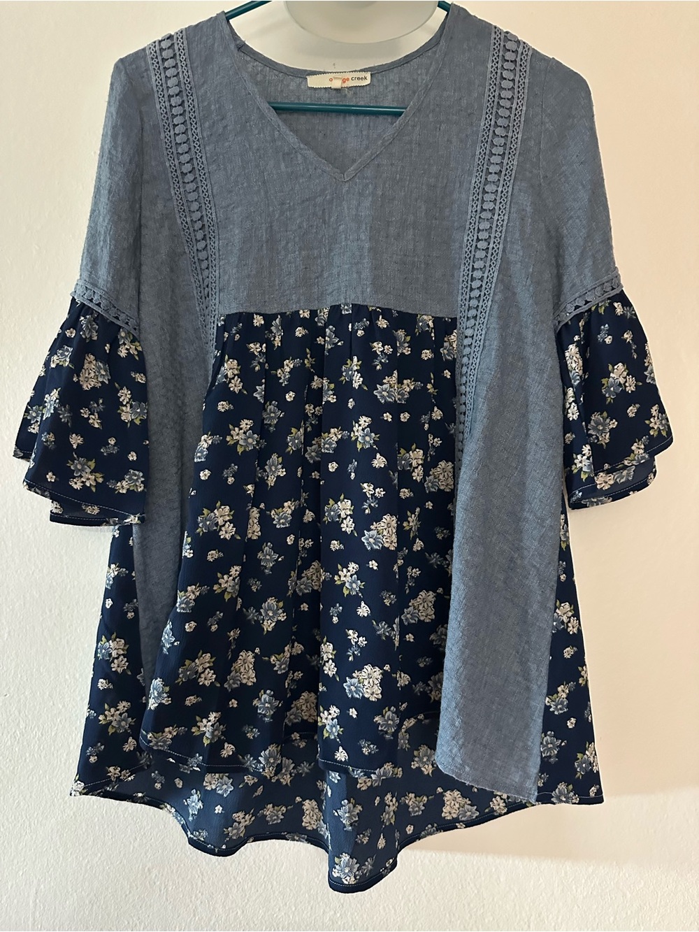 Orange Creek blouse, 3/4 sleeve, small, light blue and blue with flowers.